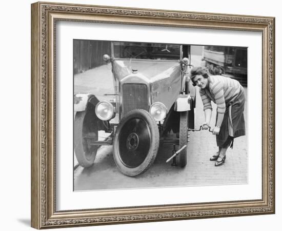 Ivy Cummings Changing a Tyre on a 1925 Singer 10/26, London, C1925-null-Framed Photographic Print