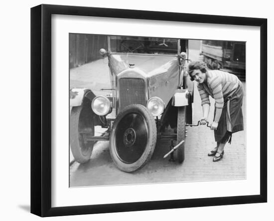 Ivy Cummings Changing a Tyre on a 1925 Singer 10/26, London, C1925-null-Framed Photographic Print