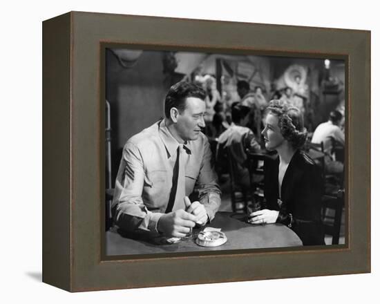 Iwo Jima Sands of Iwo Jima by AllanDwan with John Wayne and Julie Bishop, 1949 (b/w photo)-null-Framed Stretched Canvas