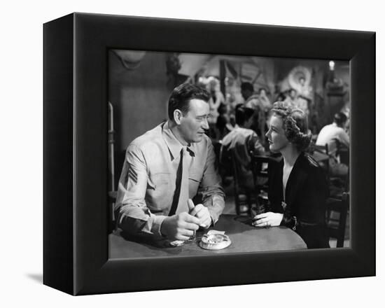 Iwo Jima Sands of Iwo Jima by AllanDwan with John Wayne and Julie Bishop, 1949 (b/w photo)-null-Framed Stretched Canvas