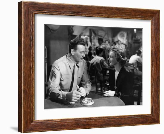 Iwo Jima Sands of Iwo Jima by AllanDwan with John Wayne and Julie Bishop, 1949 (b/w photo)-null-Framed Photo