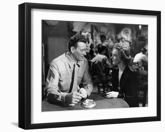 Iwo Jima Sands of Iwo Jima by AllanDwan with John Wayne and Julie Bishop, 1949 (b/w photo)-null-Framed Photo