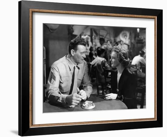 Iwo Jima Sands of Iwo Jima by AllanDwan with John Wayne and Julie Bishop, 1949 (b/w photo)-null-Framed Photo