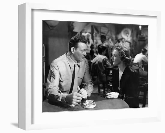 Iwo Jima Sands of Iwo Jima by AllanDwan with John Wayne and Julie Bishop, 1949 (b/w photo)-null-Framed Photo