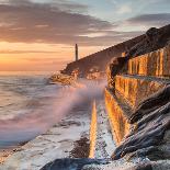 A Wave Rushes towards the Viewer along the Pier Wall at Sunset in Aberystwyth, West Wales, Uk. the-Izzy Standbridge-Framed Photographic Print