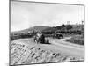 J Chassagne in the Sunbeam Leading Jules Goux in the Peugeot, French Grand Prix, Lyons, 1914-null-Mounted Photographic Print