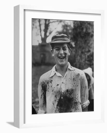 J.H.D. Briscol Having a Mud Splattered Face and Shirt After Informal Game of Football-Cornell Capa-Framed Photographic Print