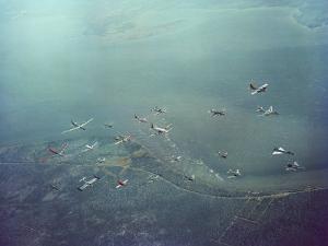 Fleet of US Air Force Operational Planes Flying in a Single Formation over Gulf Coast by J^ R^ Eyerman