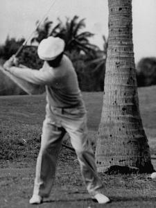 Golfer Ben Hogan, Demonstrating His Golf Drive by J^ R^ Eyerman
