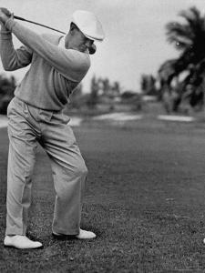 Golfer Ben Hogan, Keeping His Shoulders Level at Top of Swing by J^ R^ Eyerman