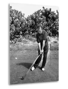 Golfer Claude Harmon Leading with Left Hip as He Hits Ball by J^ R^ Eyerman