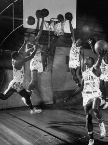 Harlem Globetrotters Playing in a Basketball Game by J^ R^ Eyerman