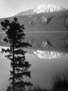 Lake Kluane with Snow-Capped Mountains Reflected in Lake by J^ R^ Eyerman