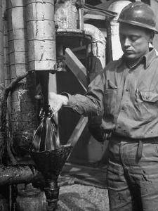 Miner Working at Oil Shale Refinery Mine by J^ R^ Eyerman