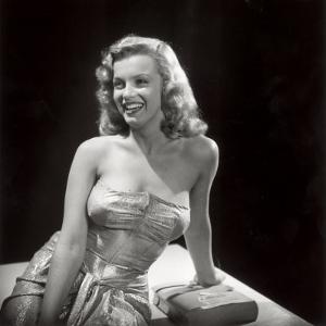 Movie Starlet Marilyn Monroe Posing in Studio by J^ R^ Eyerman
