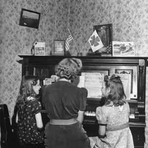 Patricia Colleen Altree Playing the Piano with Her Two Sisters by J^ R^ Eyerman