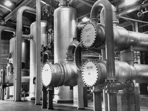 The Inside of a Gas Conservation Plant Showing Massive Pipelines by J^ R^ Eyerman