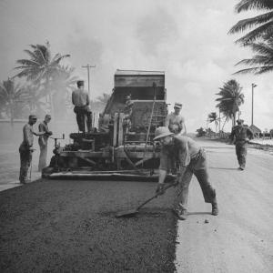 US Navy Seabees Spreading Asphalt During Creation of Air Base by J^ R^ Eyerman