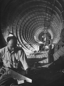 Workmen Building Flying Boat That Was Designed by Millionaire Howard R. Hughes by J^ R^ Eyerman