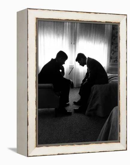 Jack Kennedy Conferring with His Brother and Campaign Organizer Bobby Kennedy in Hotel Suite-Hank Walker-Framed Premier Image Canvas
