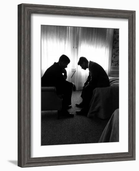 Jack Kennedy Conferring with His Brother and Campaign Organizer Bobby Kennedy in Hotel Suite-Hank Walker-Framed Premium Photographic Print