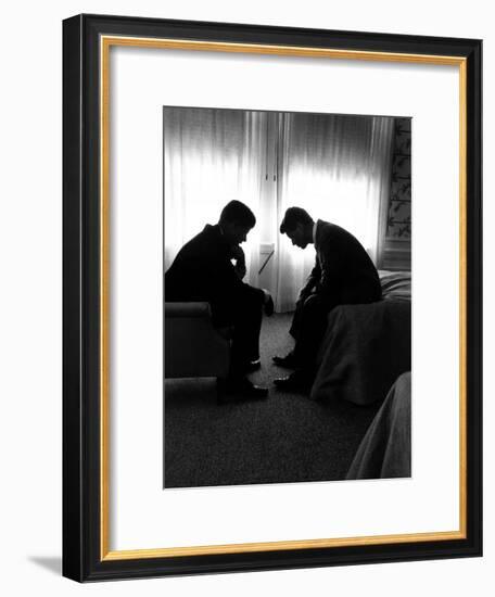 Jack Kennedy Conferring with His Brother and Campaign Organizer Bobby Kennedy in Hotel Suite-Hank Walker-Framed Premium Photographic Print