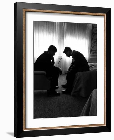 Jack Kennedy Conferring with His Brother and Campaign Organizer Bobby Kennedy in Hotel Suite-Hank Walker-Framed Premium Photographic Print