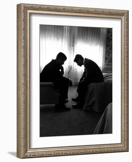 Jack Kennedy Conferring with His Brother and Campaign Organizer Bobby Kennedy in Hotel Suite-Hank Walker-Framed Photographic Print