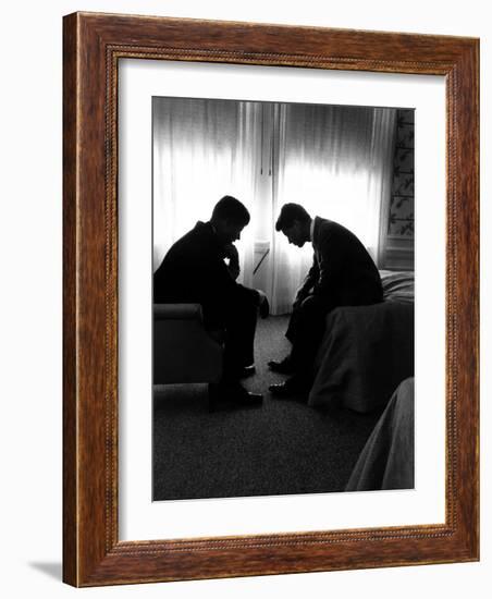 Jack Kennedy Conferring with His Brother and Campaign Organizer Bobby Kennedy in Hotel Suite-Hank Walker-Framed Photographic Print