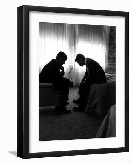 Jack Kennedy Conferring with His Brother and Campaign Organizer Bobby Kennedy in Hotel Suite-Hank Walker-Framed Photographic Print