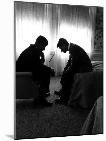 Jack Kennedy Conferring with His Brother and Campaign Organizer Bobby Kennedy in Hotel Suite-Hank Walker-Mounted Photographic Print