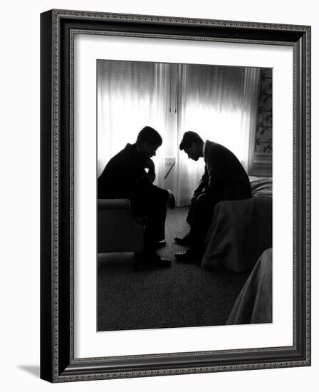 Jack Kennedy Conferring with His Brother and Campaign Organizer Bobby Kennedy in Hotel Suite-Hank Walker-Framed Photographic Print