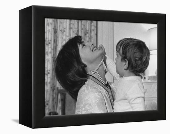 Jackie Kennedy Laughs as Her Son John Jr, Plays with Her Pearl Necklace, Nov.1962-null-Framed Stretched Canvas