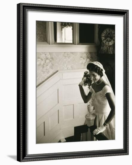 Jackie Kennedy Throwing the Bouquet-Toni Frissell-Framed Photo