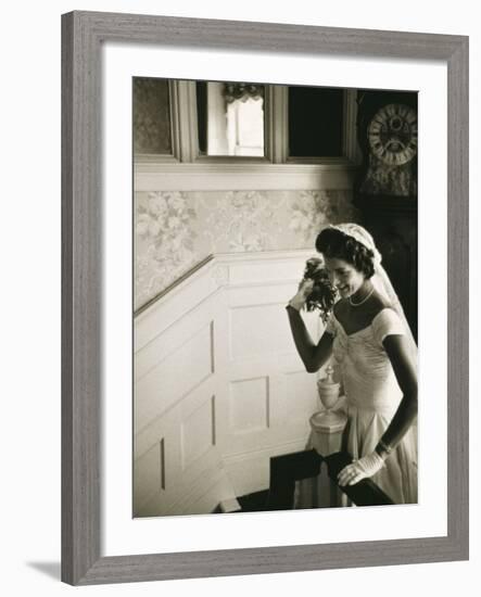 Jackie Kennedy Throwing the Bouquet-Toni Frissell-Framed Photo