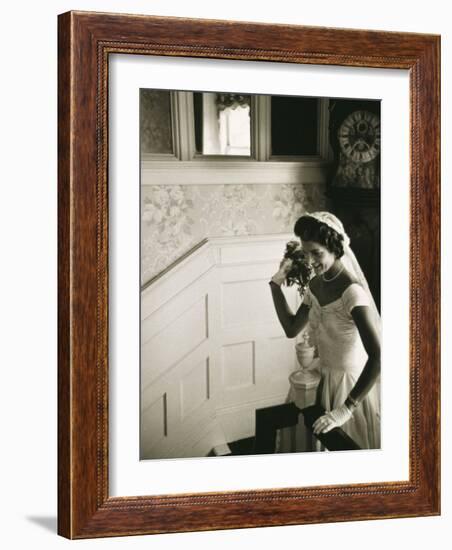 Jackie Kennedy Throwing the Bouquet-Toni Frissell-Framed Photo