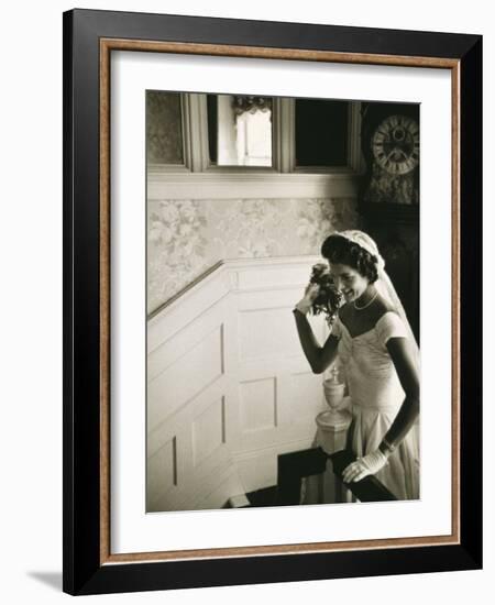 Jackie Kennedy Throwing the Bouquet-Toni Frissell-Framed Photo