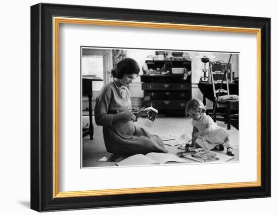 Jackie Kennedy, Wife of Sen, Cutting Out Newspaper Clippings Next to Open Scrapbook-Alfred Eisenstaedt-Framed Photographic Print