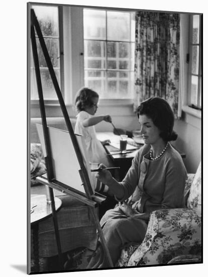 Jackie Kennedy, Wife of Sen, Painting on an easel as Daughter Caroline Paints on Table at Home-Alfred Eisenstaedt-Mounted Photographic Print