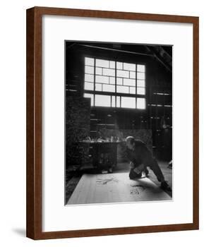 Jackson Pollock Working on a Painting-Martha Holmes-Framed Photographic Print