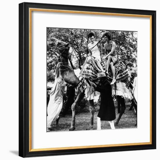 Jacqueline Kennedy and Her Sister, Princess Lee Radziwill Riding a Camel-null-Framed Photo