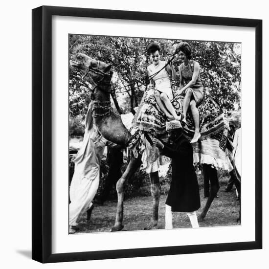 Jacqueline Kennedy and Her Sister, Princess Lee Radziwill Riding a Camel-null-Framed Photo