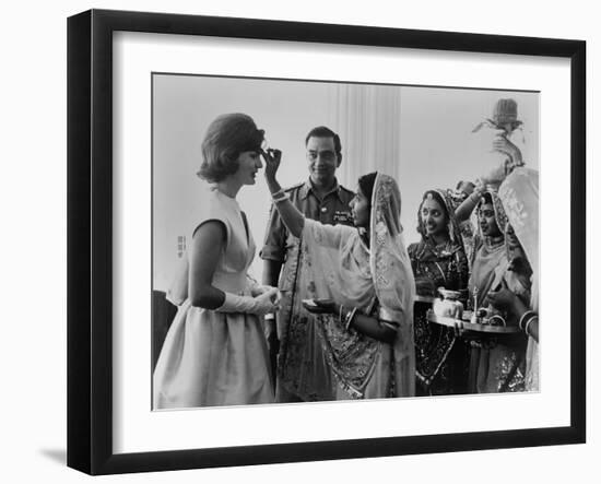 Jacqueline Kennedy Having a 'Bindi' Placed on Her Forehead at Jaipur, India-null-Framed Photo