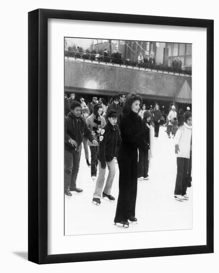 Jacqueline Kennedy Onassis Ice Skating at Rockefeller Center, New York City, Sept 9, 1970-null-Framed Photo