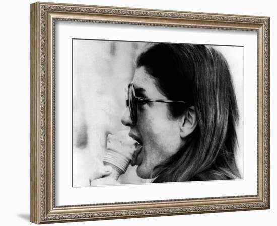 Jacqueline Kennedy Onassis Licks Ice Cream Cone While Shopping in Portofino, Italy, Jun 14, 1971-null-Framed Photo