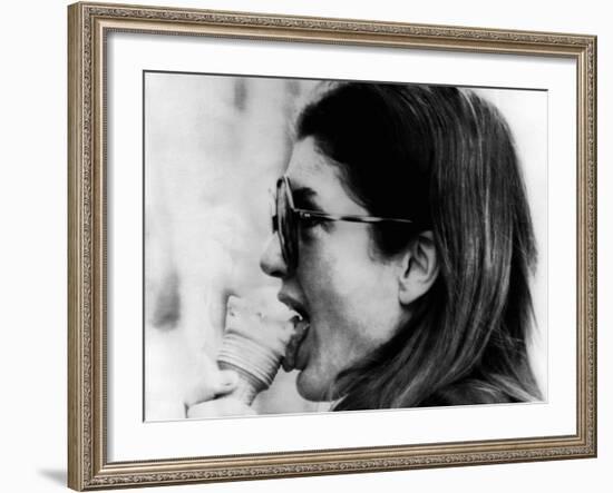 Jacqueline Kennedy Onassis Licks Ice Cream Cone While Shopping in Portofino, Italy, Jun 14, 1971-null-Framed Photo