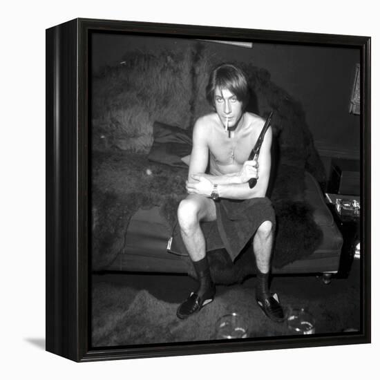 Jacques Dutronc Smoking a Cigarette and Holding a Revolver in 1971-Roldes-Framed Premier Image Canvas