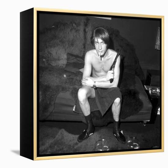 Jacques Dutronc Smoking a Cigarette and Holding a Revolver in 1971-Roldes-Framed Premier Image Canvas