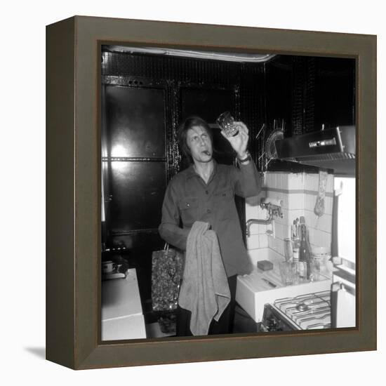 Jacques Dutronc Washing a Glass and Smoking a Cigar in 1972-Marcel Roldes-Framed Premier Image Canvas