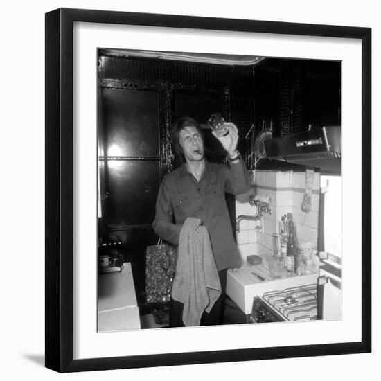 Jacques Dutronc Washing a Glass and Smoking a Cigar in 1972-Marcel Roldes-Framed Photographic Print